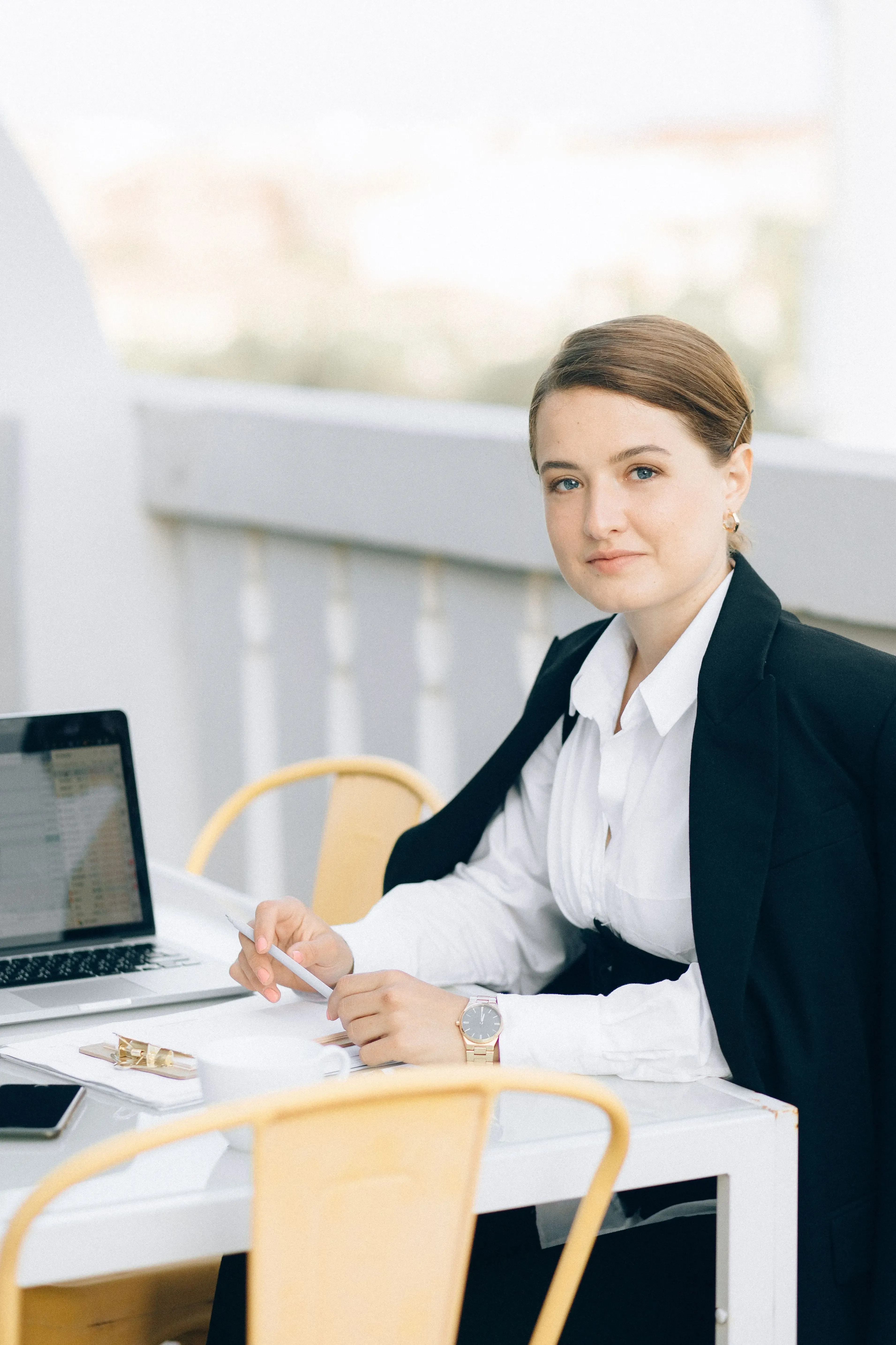 Woman wearing headphones while speaking on a support call